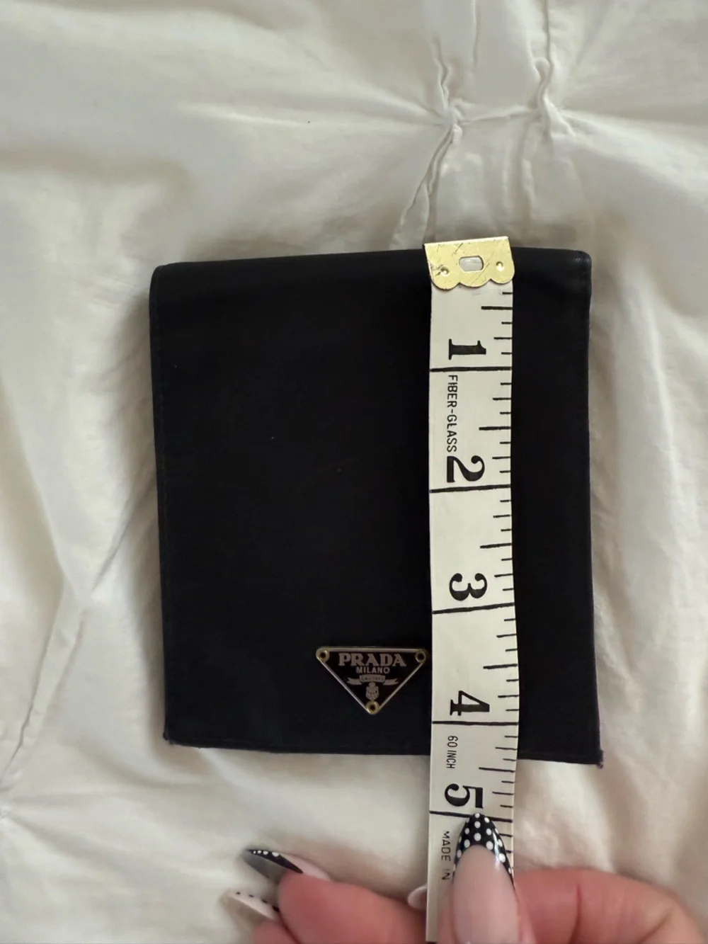 Prada triangle logo bifold wallet
